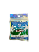 A package of PureNative Bacon dog treats in a holographic zip-top pouch with a blue front label featuring palm trees and a dog silhouette.