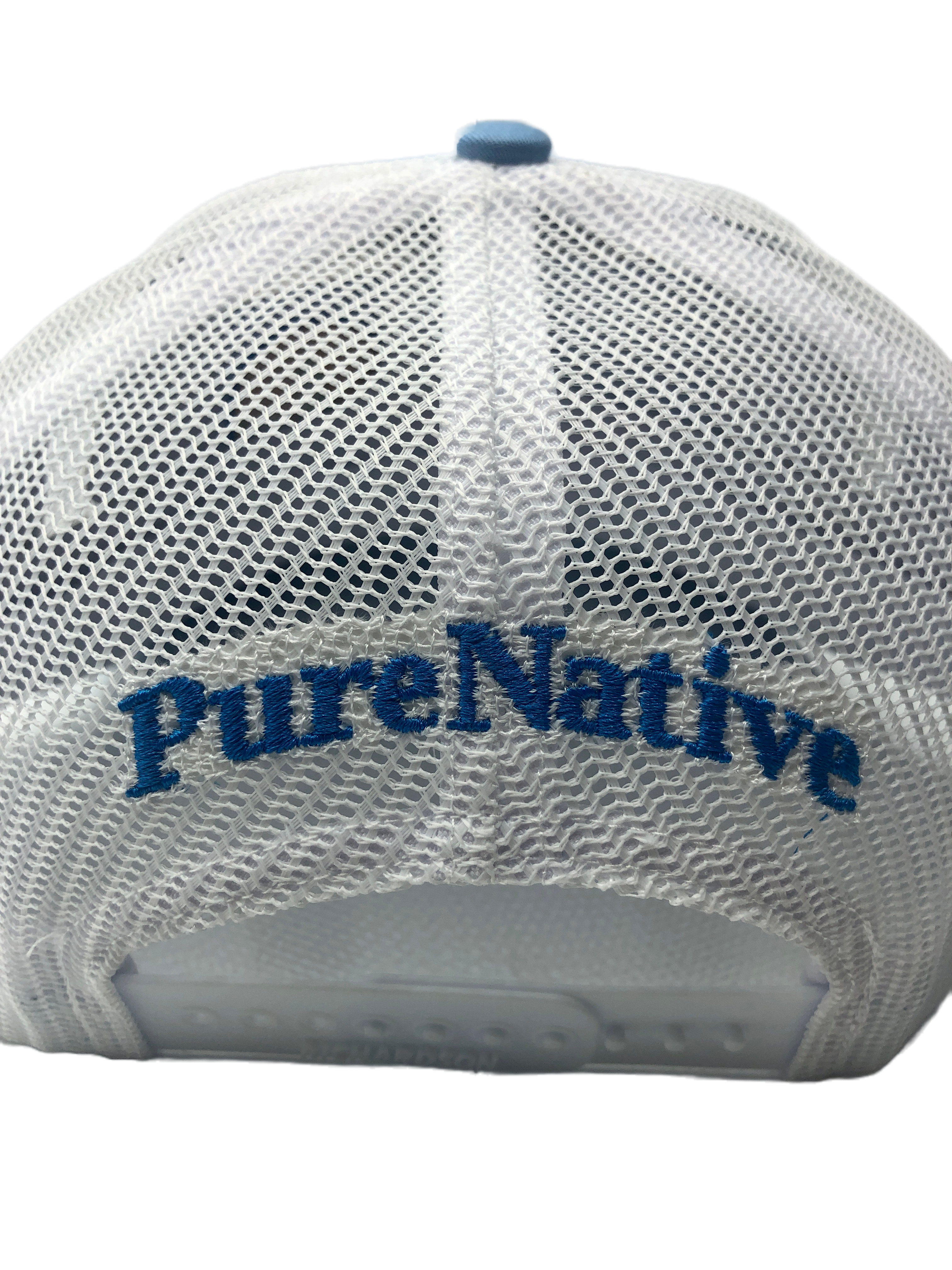 "PureNative" embroidered in blue on white nylon mesh on the back of the snapback hat.