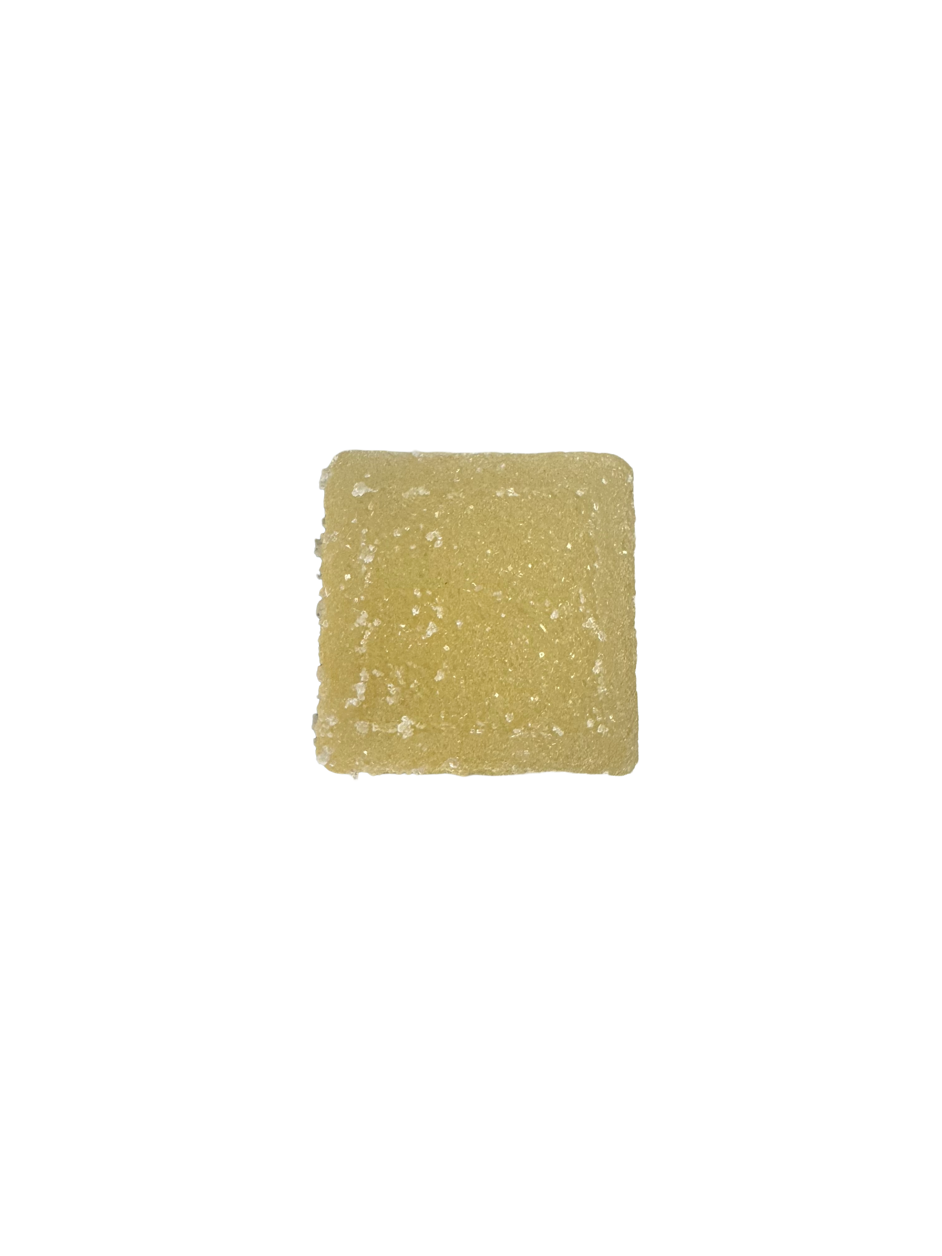 A single square sample of pale yellow-beige textured gummy.