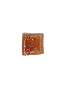 A single square piece of jellied gummy with a sugar-coated surface, isolated on a solid white background.